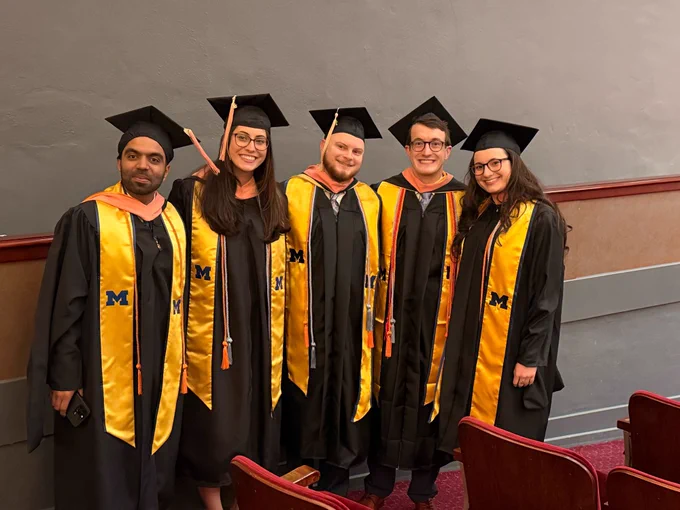 Grads in cap and gown