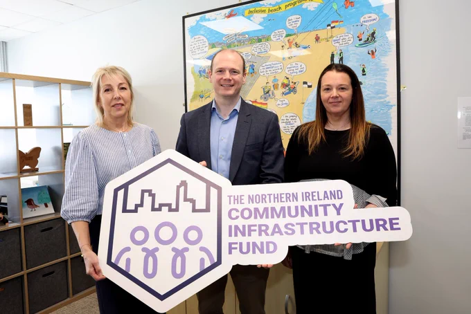 Minister Lyons is pictured with (l to r) Kyleigh Lough, CEO and Alix Crawford, Chairperson; Mae Murray Foundation, Larne.