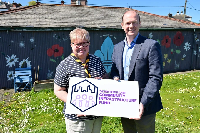 Minister Lyons (right) is pictured with Mrs Andrea McClean (left), Group Lead Volunteer, 1st Whitehead Scout Group.