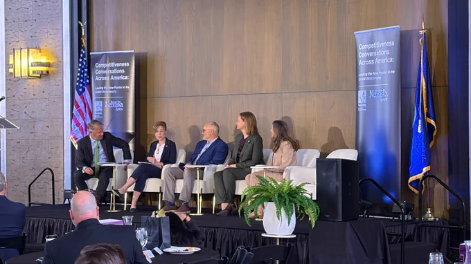 A panel of experts on the conversation stage for a discussion on the bioeconomy and national security
