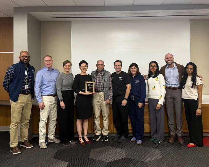 Group image of Drs. Hersh Varma, David Rogers, Hilliary Inger (alumna ’18), Lindsey Delott, Gary Rogers, Mary Lou McGregor, Amanda Way, Aaron Warning (alumnus ’25), and Shreya Prabhu.