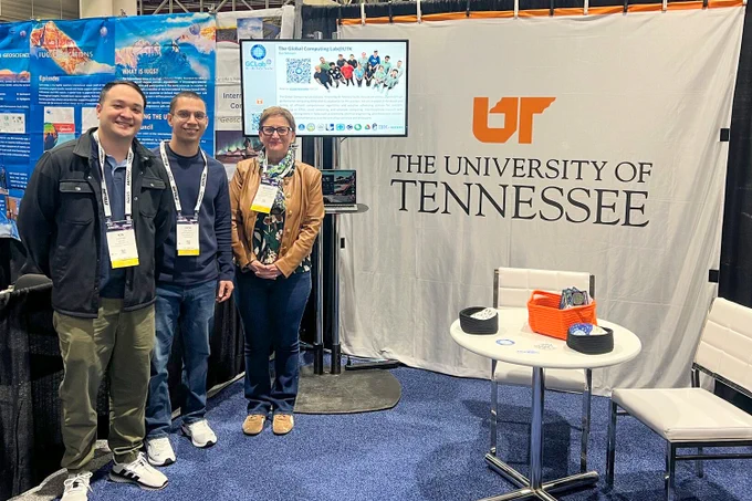 left to right: Kin NG, Jack Marquez, and Michela Taufer at the American Geophysical Union meeting