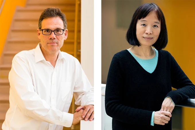 Portraits of two scientists side by side. The male scientist on the left, Michale Fee, is wearing a white button down shirt and the female scientist on the right, Fan Wang, is wearing a black sweater. Both are smiling for the camera. 