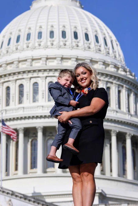 Jessica and 4-year-old Luca in front of the Capitol dome.