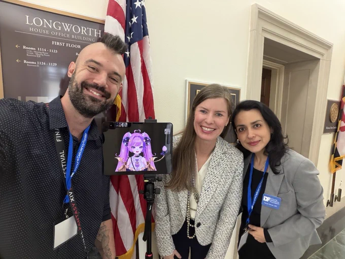 President and CEO Jorey Berry and Medical Director Paula Henao pose with Ironmouse!