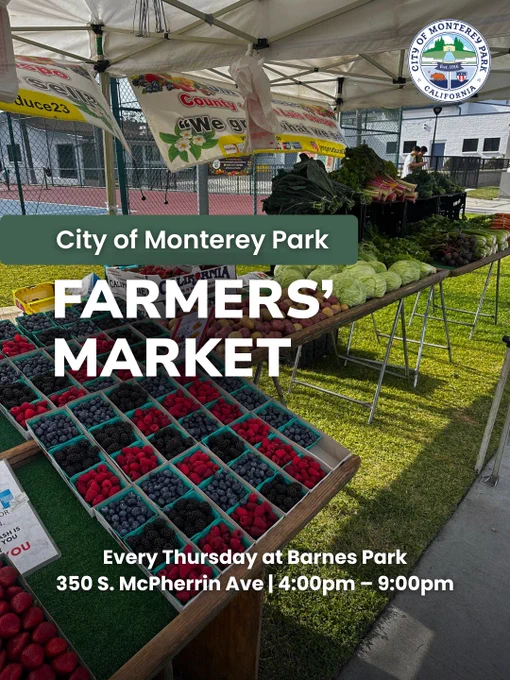 Farmers' market stall displaying berries and vegetables; City of Monterey Park market held Thursdays 4–9pm at Barnes Park.