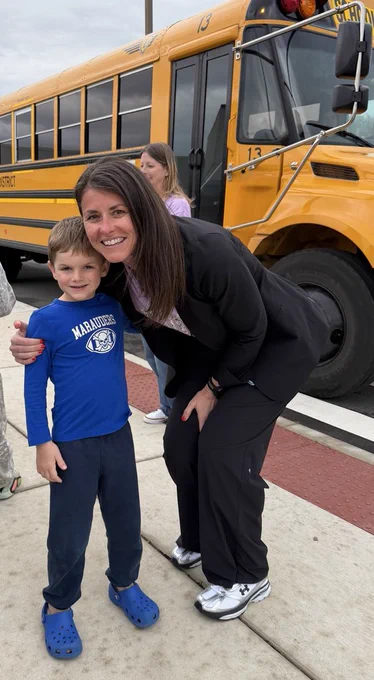 future kindergarten student posing with Hunter principal
