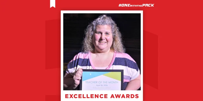 Cyndi Trimble holding a certficate