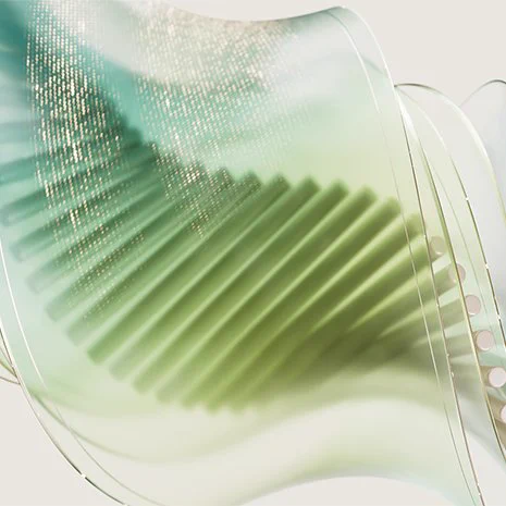 Abstract Microsoft Marketplace graphic featuring translucent green and blue layered waves, dotted digital textures, and curved lines suggesting movement, connection, and channel momentum.