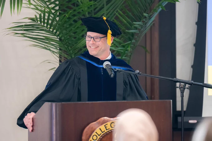 Edward Andrews, Ph.D. '01 speaks at the 2026 Phi Beta Kappa induction ceremony.