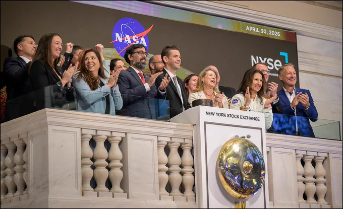 NASA Administrator Jared Isaacman, 4th from left, joined by President of NYSE Group Lynn Martin, 2nd from right, along with NASA leadership, rings the opening bell of the New York Stock Exchange, Thursday, April 30, 2026, in New York, NY. Photo Credit: (NASA/Bill Ingalls)