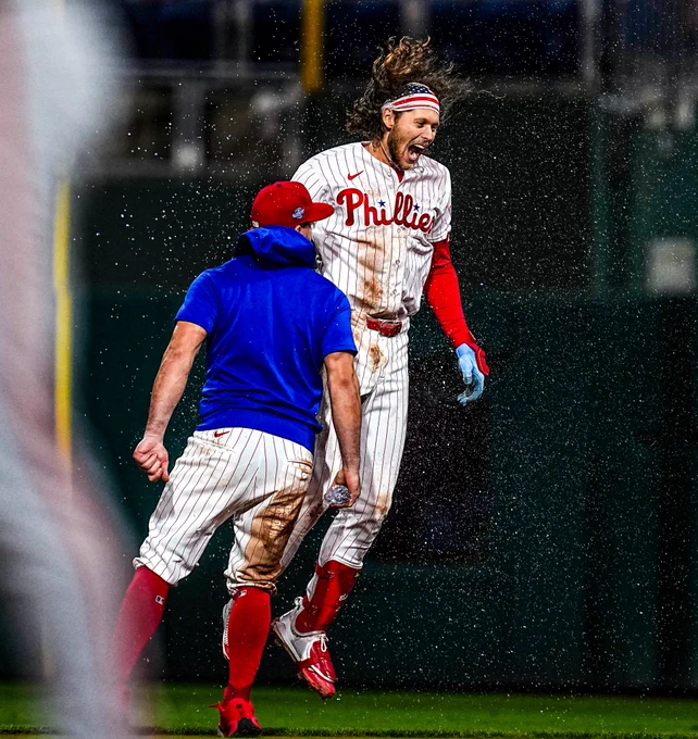 Alec Bohm celebrates his walkoff in the pinstripe Philies uniform