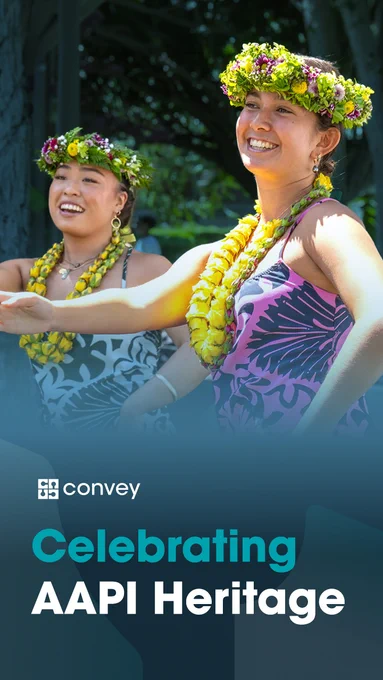two women dancing and smiling