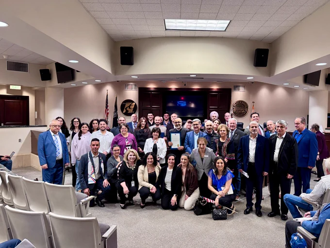 Pictured: Supervisors with the members of the Assyrian community in attendance.