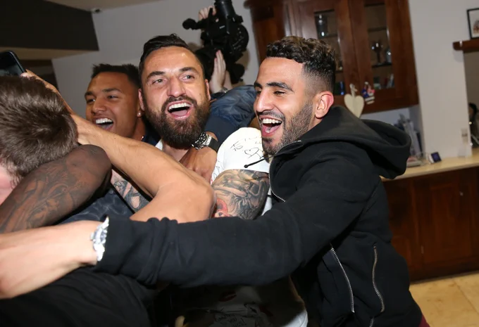 Marcin Wasilewski and Riyad Mahrez celebrate Leicester City's Premier League title win in 2016.