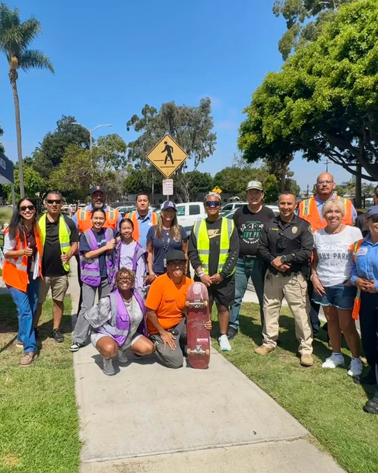 Group photo of volunteers at a community clean up.
