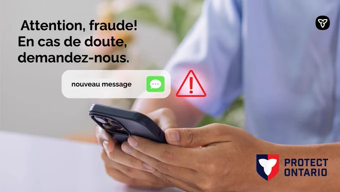 Téléphone avec notification d’alerte. Copy : Attention, fraude! En cas de doute, demandez-nous.