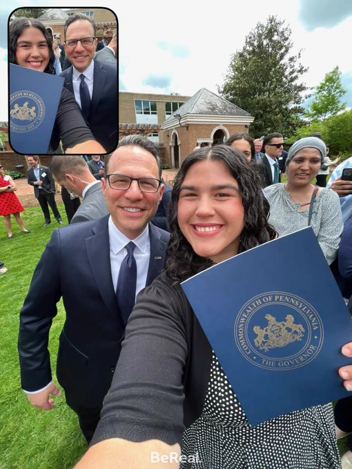Image of Alison Bilbay with Governor Shapiro as she holds her award.
