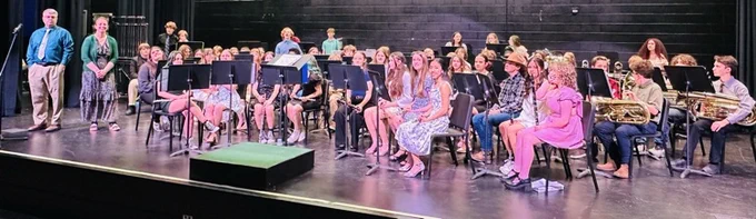 students preparing to play