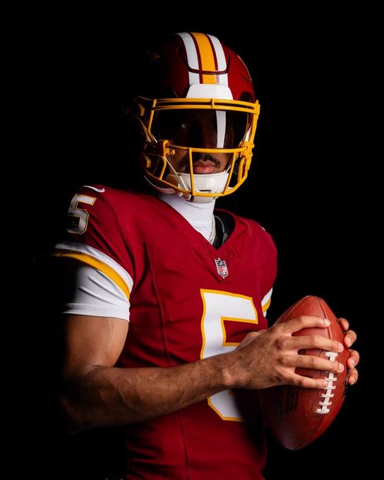 Photo of Jayden Daniels in our new burgundy uniforms.
