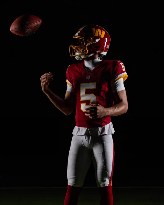 Photo of Jayden Daniels in our new burgundy uniforms.