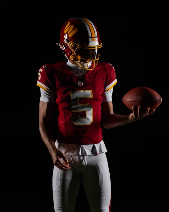 Photo of Jayden Daniels in our new burgundy uniforms.