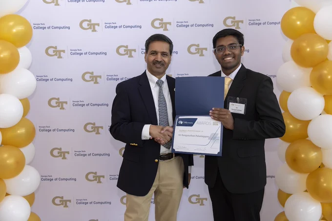 Photo of Sri Ranganathan Palaniappan accepting the Donald V. Jackson Fellowship at the 35th Annual College of Computing Awards Celebration on April 20.