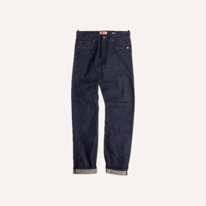 A picture of a pair of jeans by Seven Titans, made using denim fabric sourced by the legendary White Oak Mill and made by Proximity Manufacturing. Everything from the fabric to the buttons are 100% made in USA.