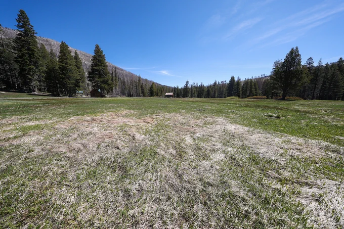The California Department of Water Resources skipped its May snow survey at Phillips Station in the Sierra Nevada due to a lack of snow. The site, where four previous media snow surveys were held for the 2026 season, is approximately 90 miles east of Sacramento off Highway 50 in El Dorado County. Photo taken May 1, 2026. 

