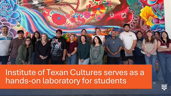 A group of people standing in front of a vibrant, colorful mural featuring various artistic elements. A banner below reads, "Institute of Texan Cultures serves as a hands-on laboratory for students.