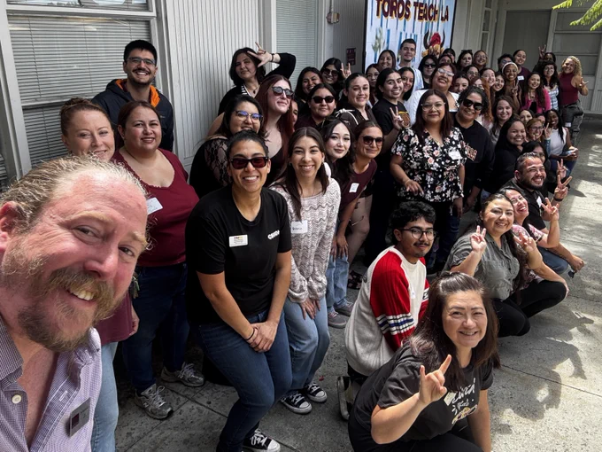 Dr. Mike Karlin, Chair of the Liberal Studies department, taking selfie with Liberal Studies seniors