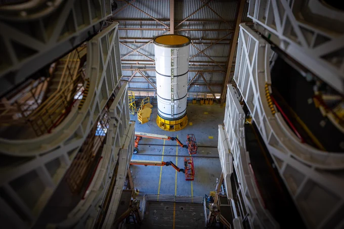 The left-hand forward solid rocket booster segment for NASA\u2019s Artemis III SLS (Space Launch System) rocket is removed from its shipping container ahead of processing inside the Rotation, Processing and Surge Facility at the agency\u2019s Kennedy Space Center in Florida on Wednesday, April 15, 2026. Credit: NASA/Frank Michaux 