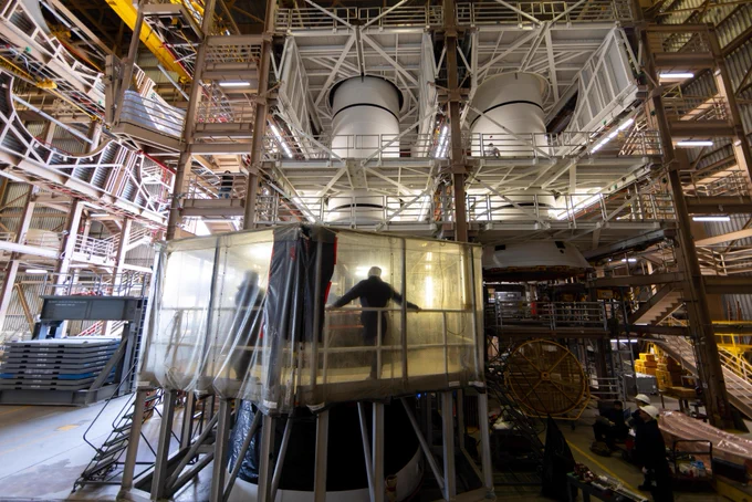 The left-hand and right-hand solid rocket booster aft segments, or bottom sections, for NASA\u2019s Artemis III SLS (Space Launch System) rocket are seen inside the Rotation, Processing and Surge Facility at the agency\u2019s Kennedy Space Center in Florida on Tuesday, April 28, 2026. Credit: NASA/Glenn Benson
