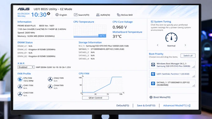 Computer screen displaying ASUS UEFI BIOS Utility in EZ Mode. System info, storage details, fan profiles, and boot priority are visible.