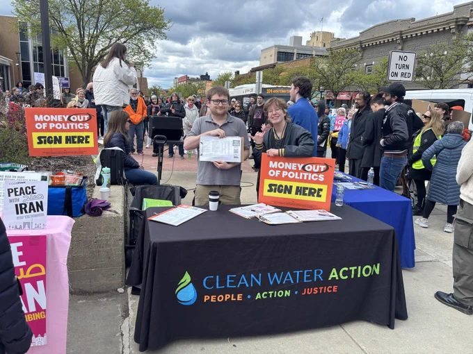 Money out of Politics tabling at Ann Arbor May Day with Clean Water Action