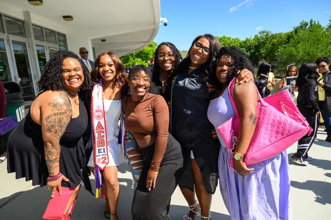 Ohio University graduate poses for a family photo.