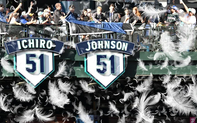 Explosion of feathers in the air as fans unveil Randy Johnson's retired number at T-Mobile Park