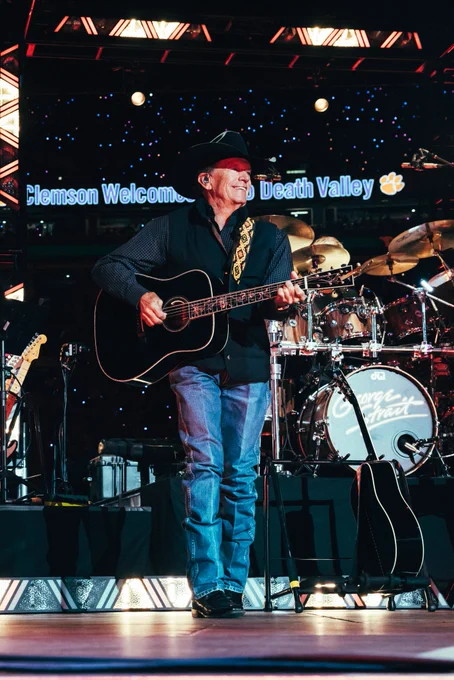 George Strait performs inside Clemson's Memorial Stadium.