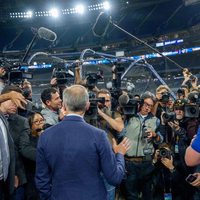 Prime Minister Mark Carney speaks with reporters as he attends the Toronto Blue Jays’ practice at the Rogers Centre ahead of the 2025 World Series.