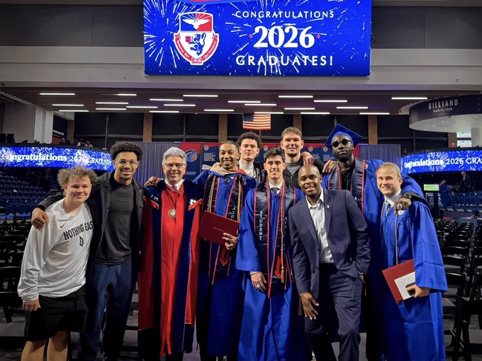 Group photo with Ken Gormley at graduation