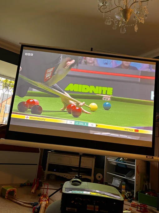 A photo of snooker on a projection screen in my lounge