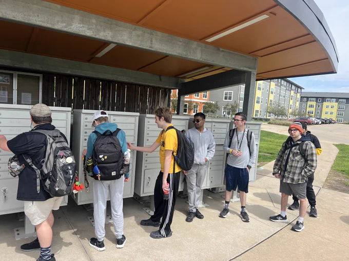 Students check out Aspire's mailboxes.