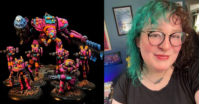 Split image for a Seasons of Pride feature. On the left, a group of vividly painted miniature mechs in bright pink, orange, and teal stand on textured bases, including a large central mech with heavy weaponry surrounded by smaller units. On the right, Jamie Daggers, smiling person with teal and brown hair, glasses, and facial piercings poses indoors, with framed artwork visible behind them.
