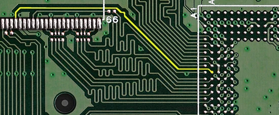 portion of a circuit board with a single long trace highlighted