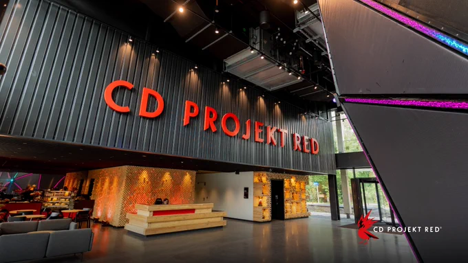 Reception area of the CD PROJEKT RED headquarters with the company name fixed to the wall.