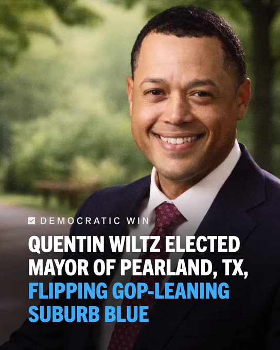 A headshot of Quentin Wiltz set against a blurred outdoor background. Text overlaid reads: "Democratic win: Quentin Wiltz elected Mayor of Pearland, TX, flipping GOP-leaning suburb blue."