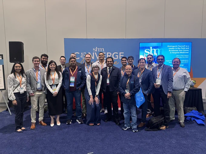 Group photo of Texas hospitalists and chapter leaders at SHM Converge 2026, standing together in front of the conference backdrop with badges.