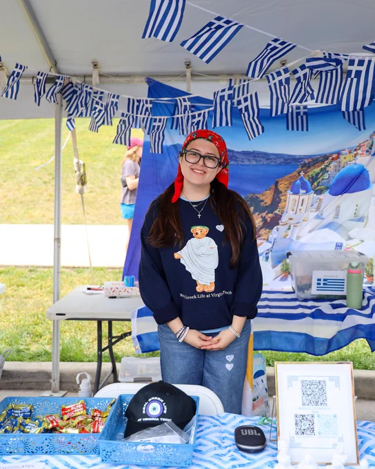 a person posing for the camera at a table