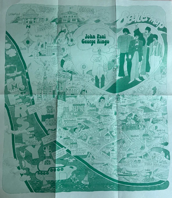A map, in variations of green, showing important Beatles landmarks — their birthplaces, homes, schools, and other whimsical places. On the left, there's a large river that says Mersey with a submarine, and at the top right there is a drawing of each Beatle.