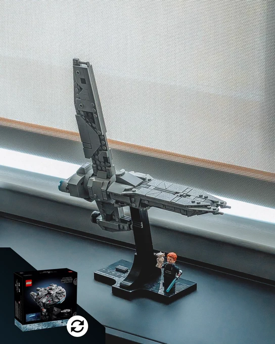 On a sleek black metal shelf, a small-sized, LEGO brick-built rendition of the Stinger Mantis ship from the game Star Wars Jedi: Survivor is posed next to a small Cal Kestis minifigure holding up an even smaller BD-1 minifigure. Digitally overlaid on the image is the boxart for the midi-scale Millennium Falcon for comparison.
